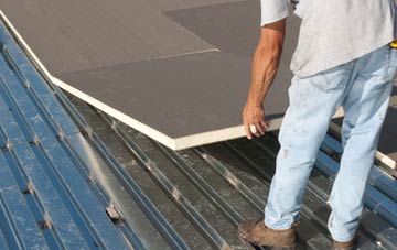 benefits of insulating Whiteash Green flat roofing
